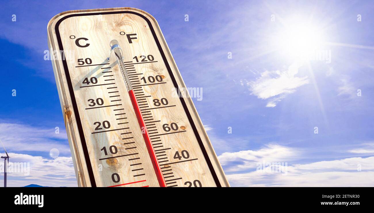 The thermometer outside the window shows a very hot air temperature, heated  by the rays Stock Photo by skaron2022