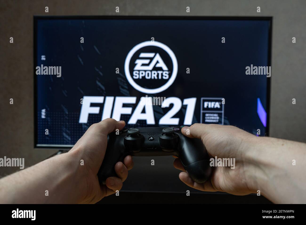 Point of view video gaming. Playing video game on Playstation. Fifa 2021  Stock Photo - Alamy
