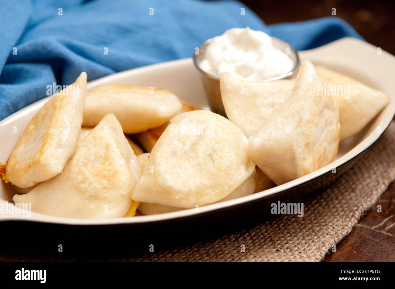 crispy pan fried pierogie or perogie wit heavy yogurt instead of sour