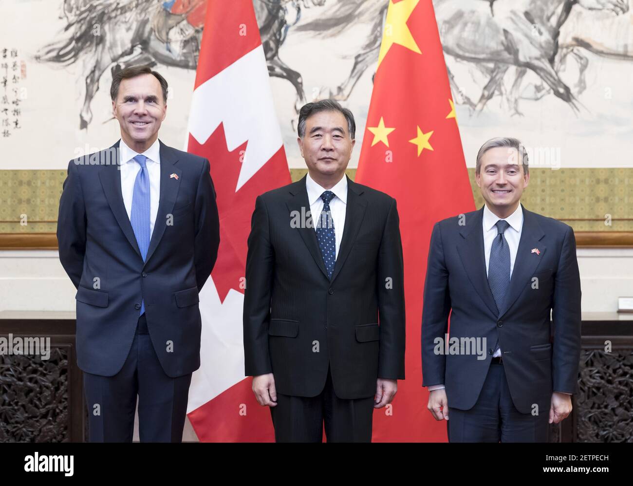 (170425) -- BEIJING , April 25, 2017 (Xinhua) -- Chinese Vice Premier Wang Yang (C), along with Canadian Finance Minister Morneau (L) and Canadian International Trade Minister Champagne, launches the China-Canada Economic and Financial Strategic Dialogue in Beijing, capital of China, April 25, 2017. (Xinhua/Ding Haitao) (dhf) (Photo by Xinhua/Sipa USA) Stock Photo