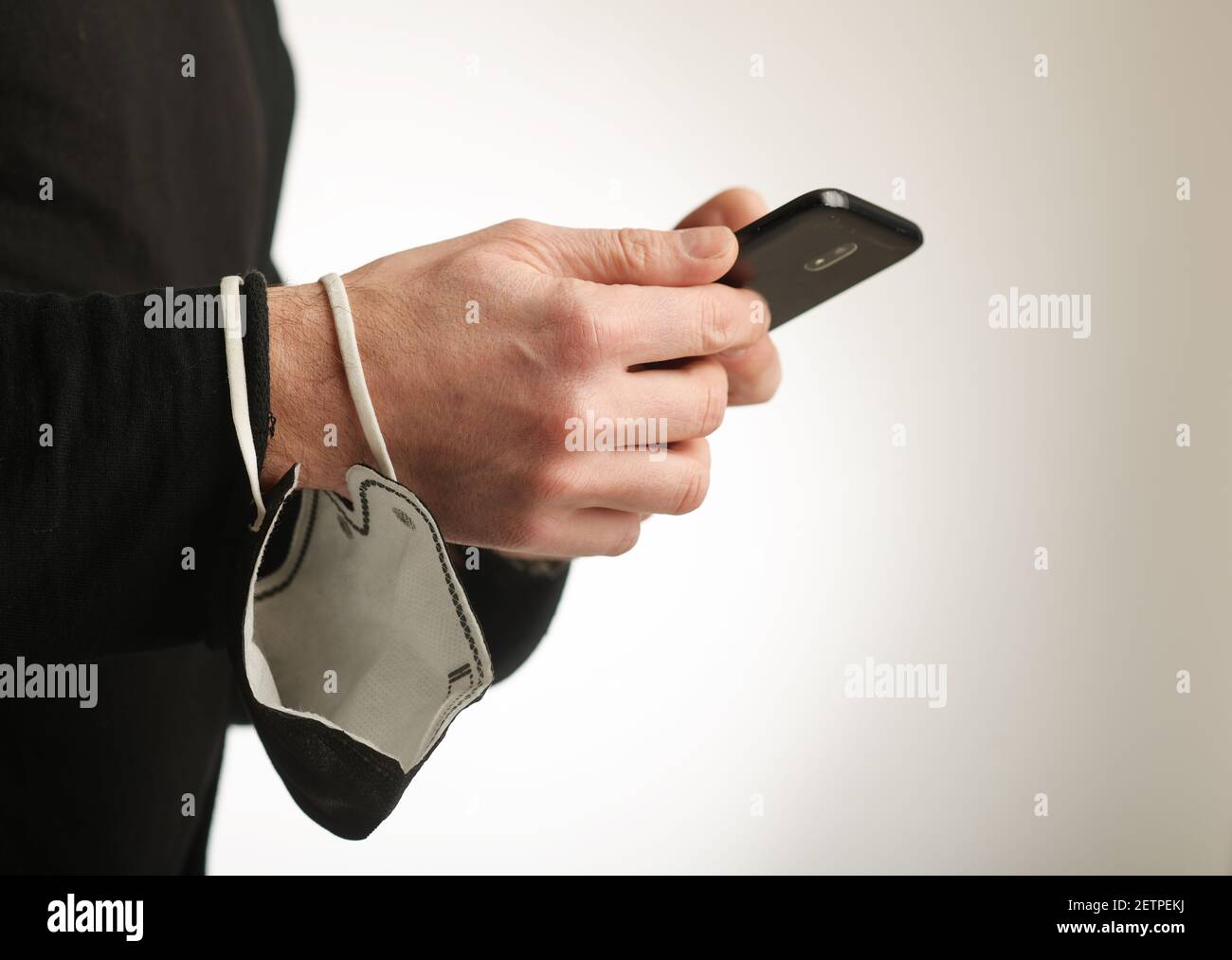 A man wearing a black face mask nano FFP2 Stock Photo