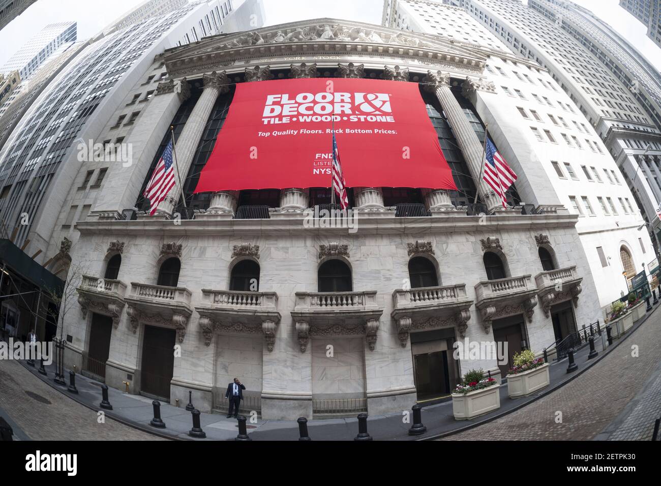 The facade of the New York Stock Exchange is decorated for the first day of  trading for Floor & Decor Holding's initial public offering on Thursday,  April 27, 2017. Floor & Decor