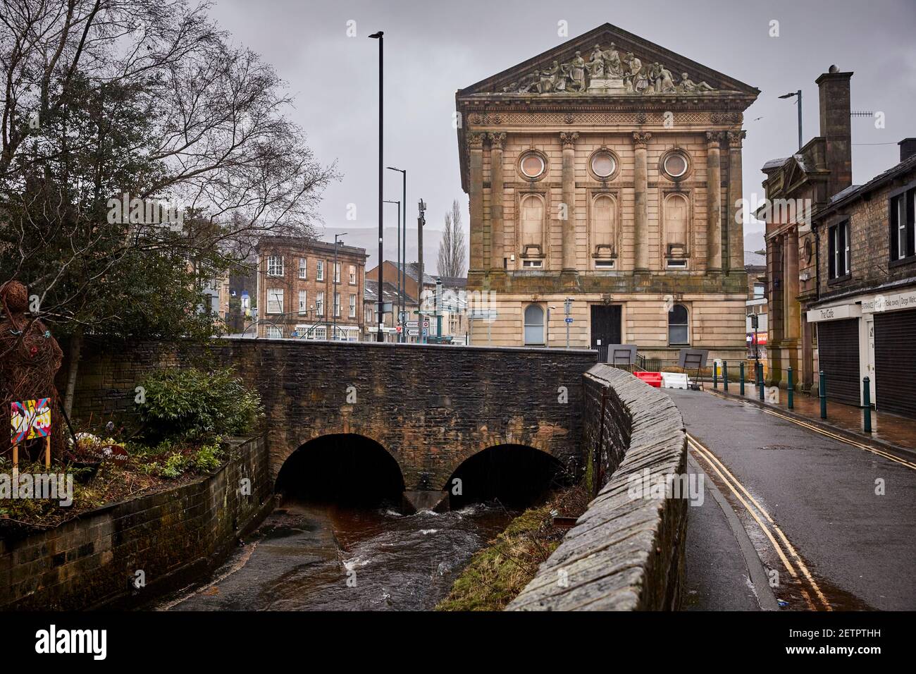 Todmorden viaduct with Burnley Rd and Todmorden Town Hall in the wet