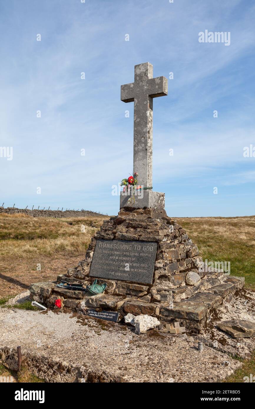 Stone memorial cross on the summit of Buckden Pike in Wharfedale, Yorkshire Dales marking a WW2 plane crash site Stock Photo