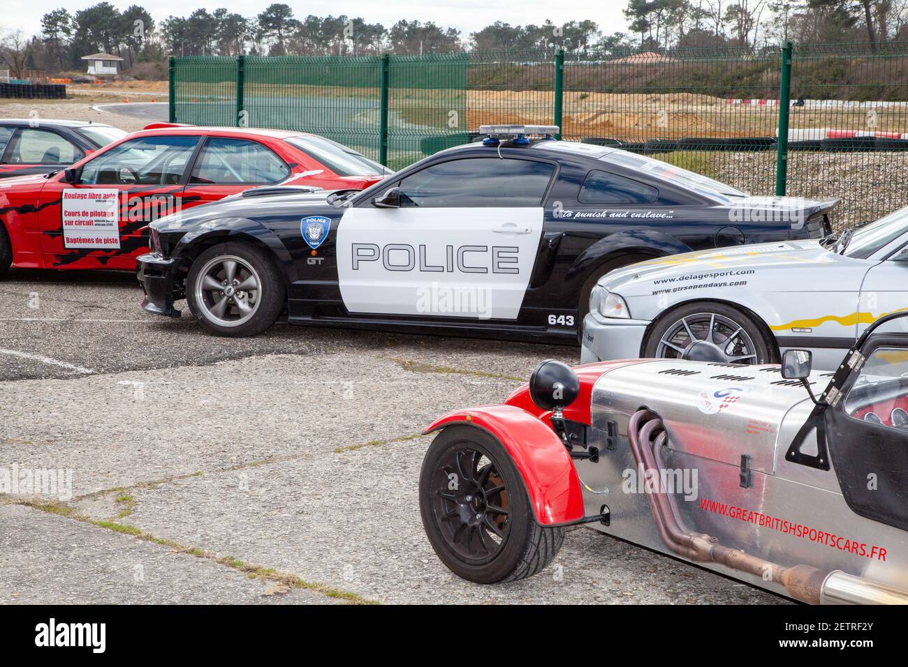 Bordeaux , Aquitaine  France - 12 28 2020 : Ford Mustang police car Transformers Film with bmw and lotus 7 caterham seven in racing car show race Stock Photo
