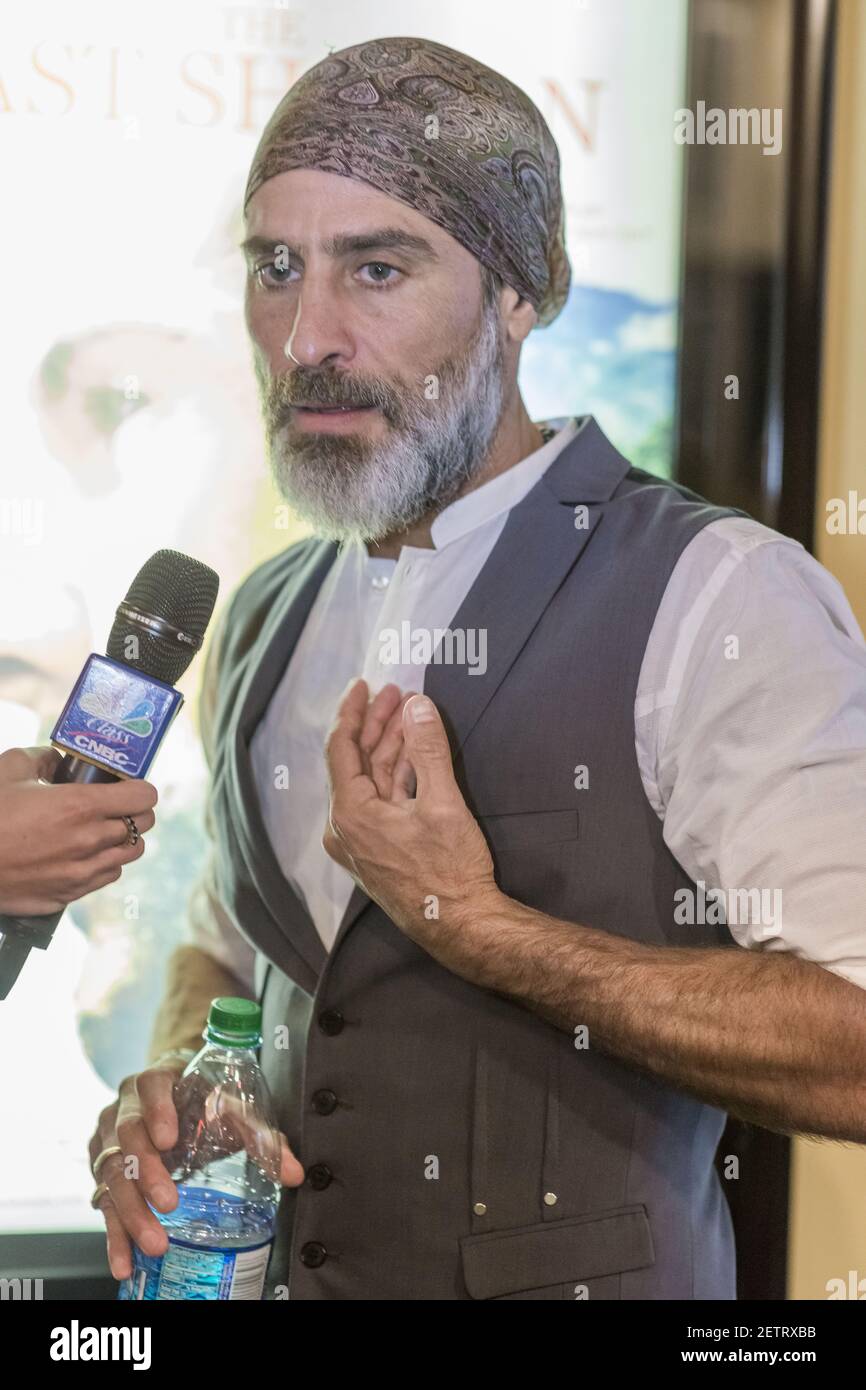 Raz Degan is seen in the lobby of the Landmark Sunshine Theater before ...