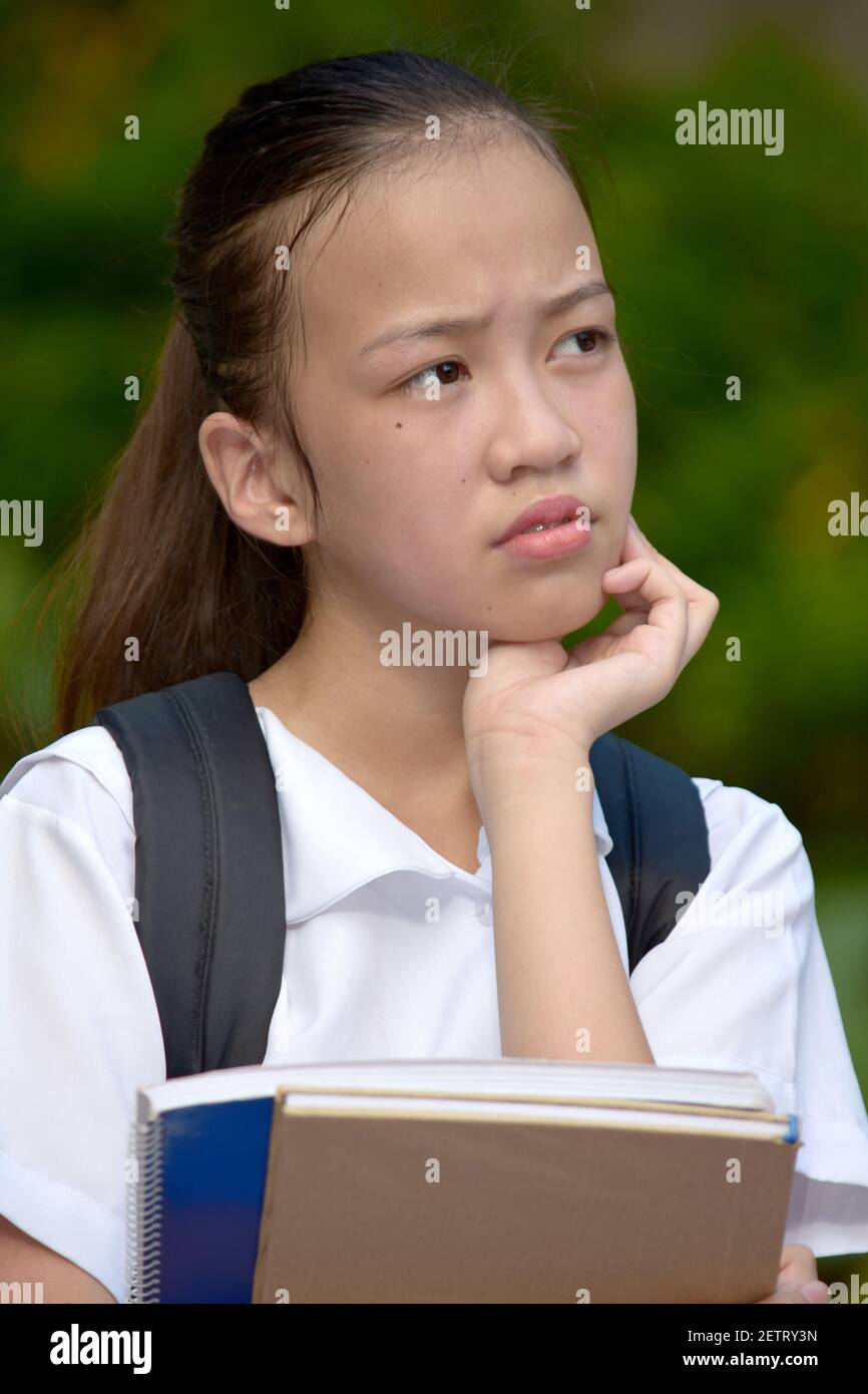 A Filipina Girl Student Thinking Stock Photo - Alamy