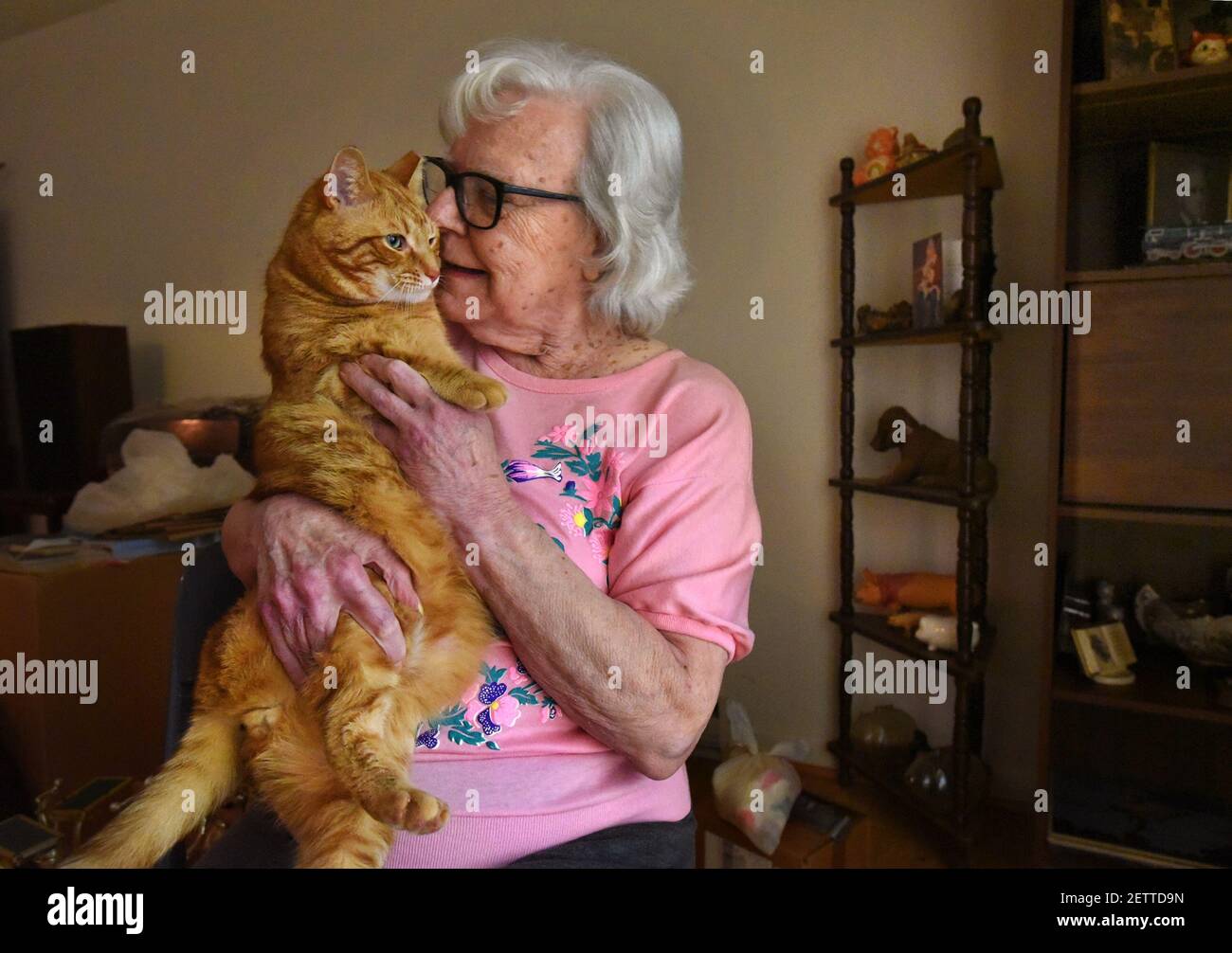 Lillian Haughawout, 80, embraces her cat, Tiger, on May 8, 2017 at her home  in Nanjemoy, Md. She was reunited last December with the daughter she gave  up for adoption when she