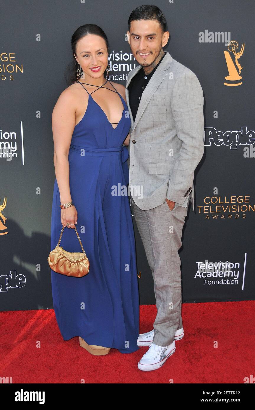 (L-R) Janiece Sarduy and Richard Cabral arrives at the 38th College Television Awards held at