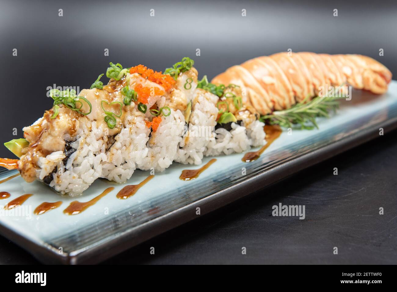Lobster sushi roll with beautiful presentation on the plate including the shell Stock Photo Alamy