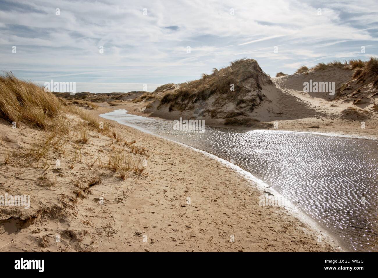 Walking through the slufter valley on the Wadden island of Texel, a sandy plain that is openly connected to the North Sea, the Netherlands Stock Photo