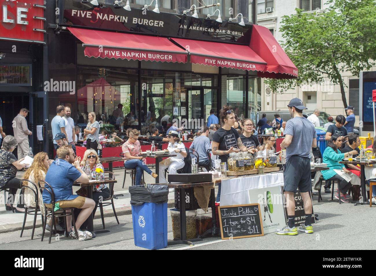 Local Businesses Five Napkin Burger And Jacob S Pickles Move Out Into The Street During A Street Fair In The Upper West Side Neighborhood Of New York On Sunday May 28 2017 Photo