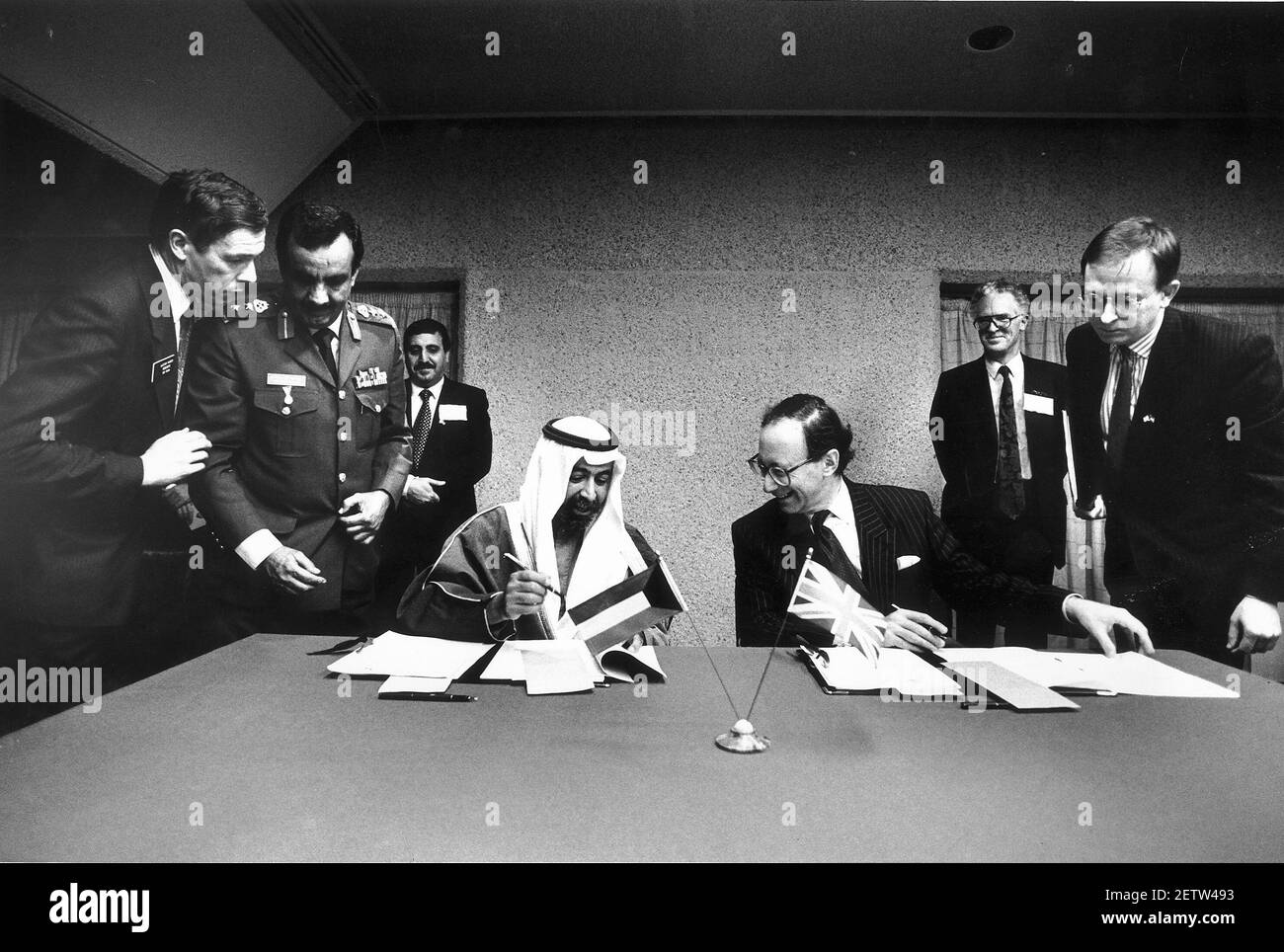 Malcolm Rifkind Defence Secretary & Kuwait Minister Ali Sabah Al Salim Al Sabah signing  a memorandum Stock Photo