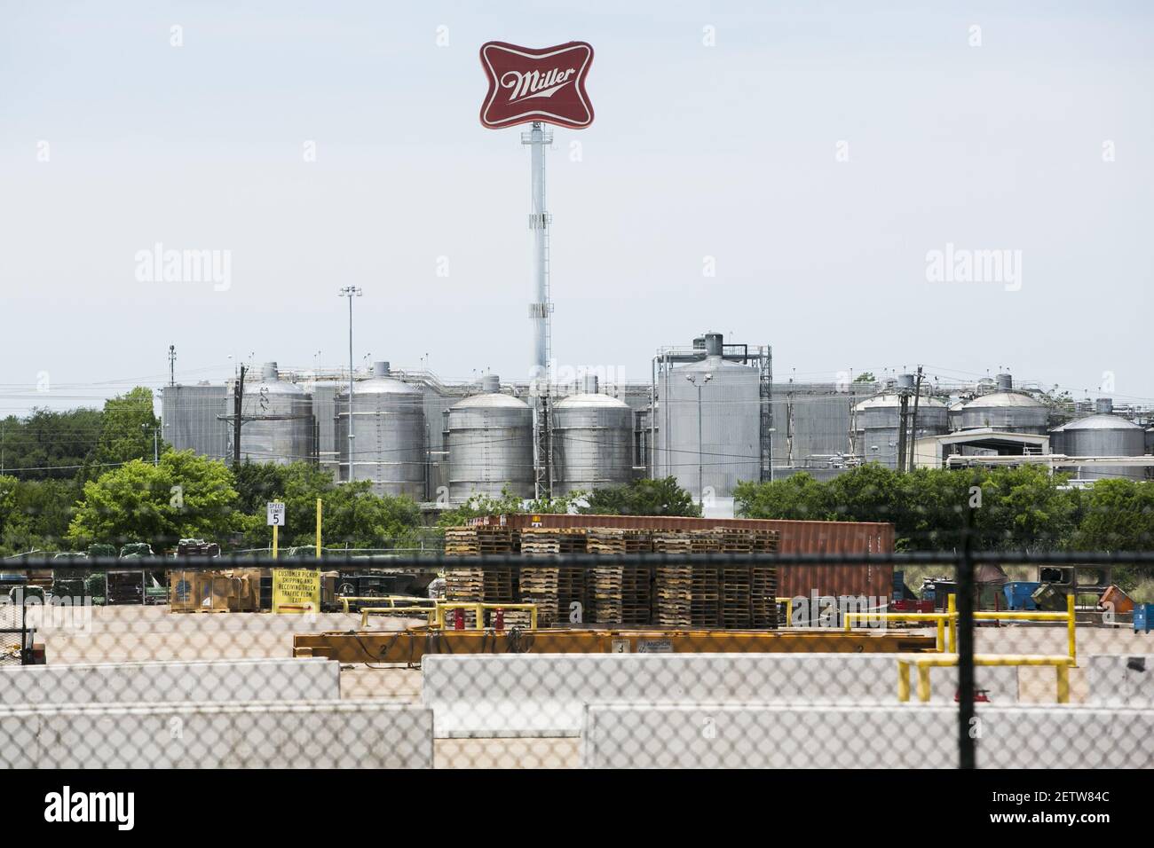 A logo sign outside of a Miller Brewing Company brewery in Fort Worth ...