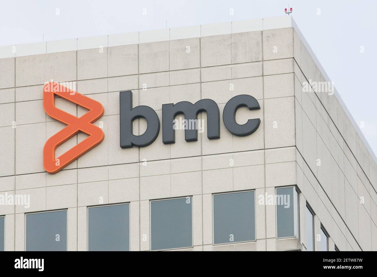 A logo sign outside of the headquarters of BMC Software in Houston