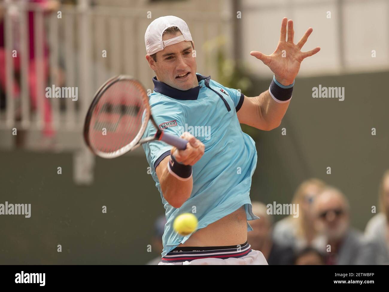 Jun 4, 2017; Paris, France; John Isner (USA) in action during his match  against Karen Khachanov (RUS) (not pictured) on day eight of the 2017  French Open tennis tournament at Stade Roland