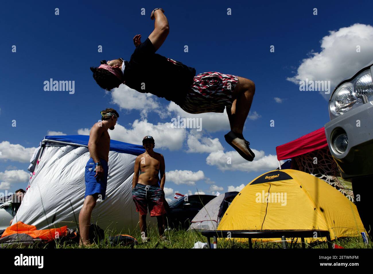 June 8 2017; Manchester, TN, USA; Bridges Tipton, of Memphis, Tennessee, does a backflip off of a small trampoline in the campgrounds at Bonnaroo Music and Arts Festival. Mandatory Credit: Calvin Mattheis/Knoxville News Sentinel via USA TODAY NETWORK *** Please Use Credit from Credit Field *** Stock Photo