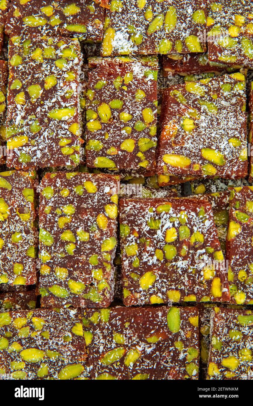 Traditional Turkish dessert or delight Cezerye for ramadan holiday. Stock Photo