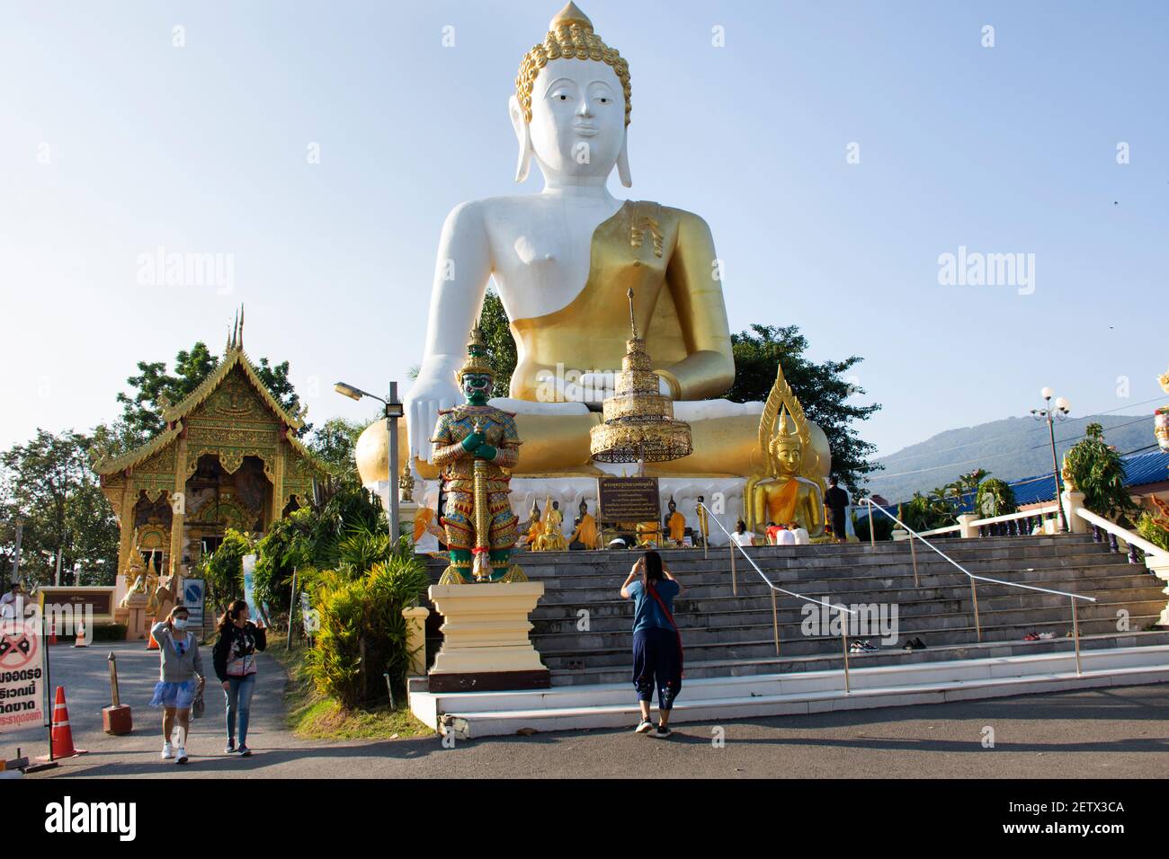 Big golden buddha image statue of Wat Phra That Doi Kham Temple for ...