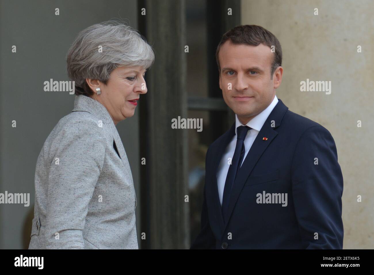 French President Emmanuel Macron welcomes British PM, Theresa May, as she arrives at The Élysée Palace . On Tuesday, June 13, 2017, in Paris, France. Photo by Artur Widak *** Please Use Credit from Credit Field ***  Stock Photo