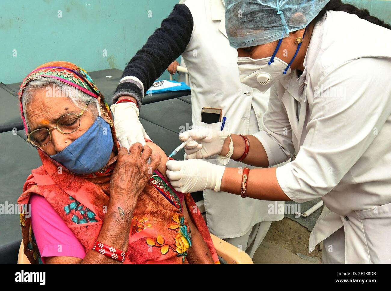 Beawar, India. 02nd Mar, 2021. An elderly woman being administered COVID-19 vaccine, during a countrywide inoculation drive, at Government hospital in Beawar. The second phase of the Covid-19 vaccination drive started for people 60 years of age and above. 70 years old Indian Prime Minister Narendra Modi also received his first dose of Corona vaccine at AIIMS in New Delhi on Monday. (Photo by Sumit Saraswat/Pacific Press) Credit: Pacific Press Media Production Corp./Alamy Live News Stock Photo