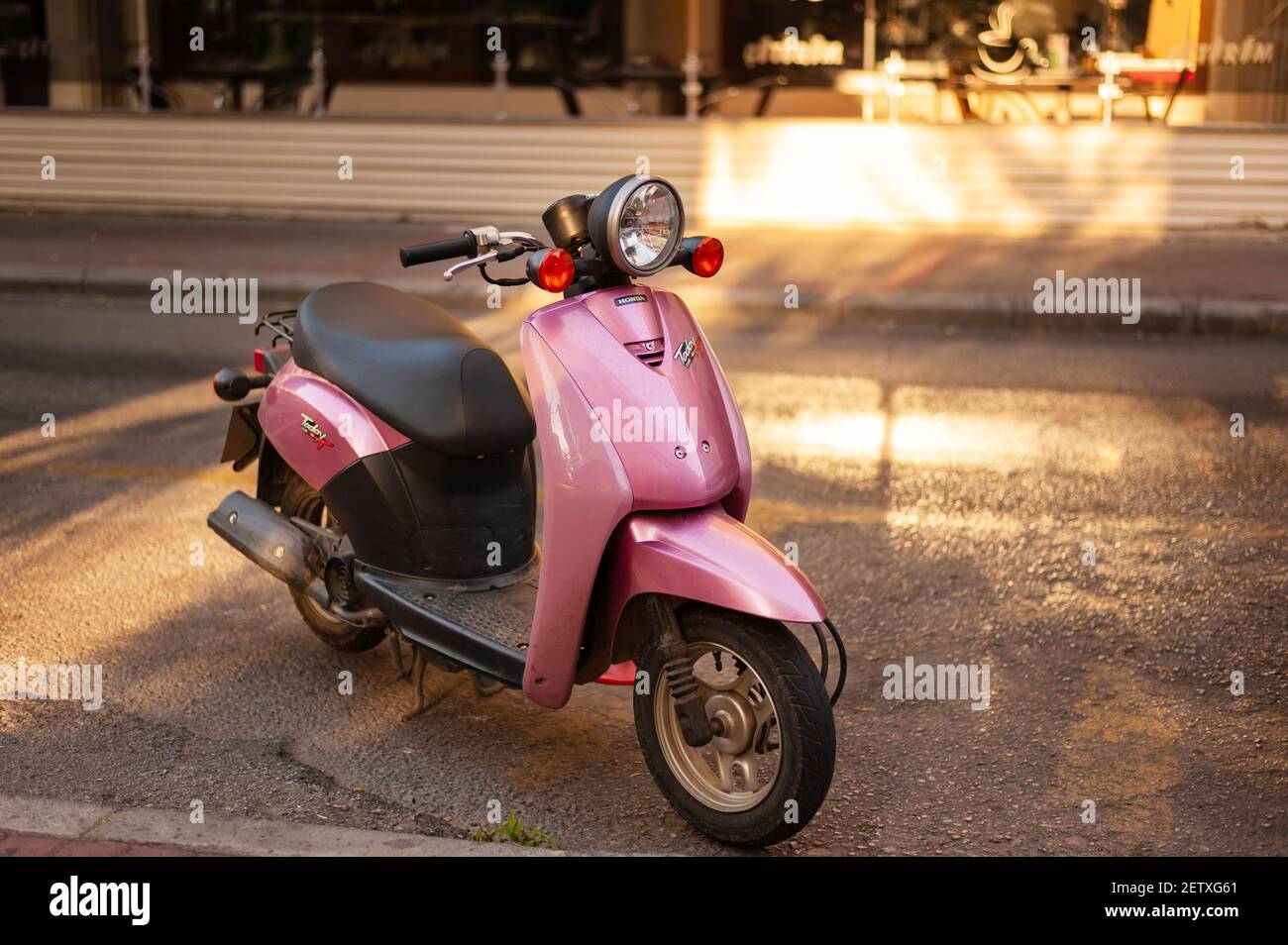 Alanya, Turkey - August 30, 2013. Pink color Honda Today 50 scooter at the  street of touristic city Alanya Stock Photo - Alamy