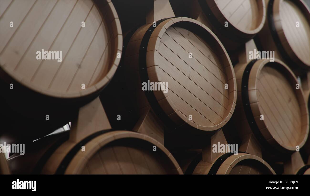 Barrels of wine, whiskey, bourbon liqueur or cognac in the basement. Aging of alcohol in oak barrels in warehouse. Wine, beer, whiskey casks stacked i Stock Photo