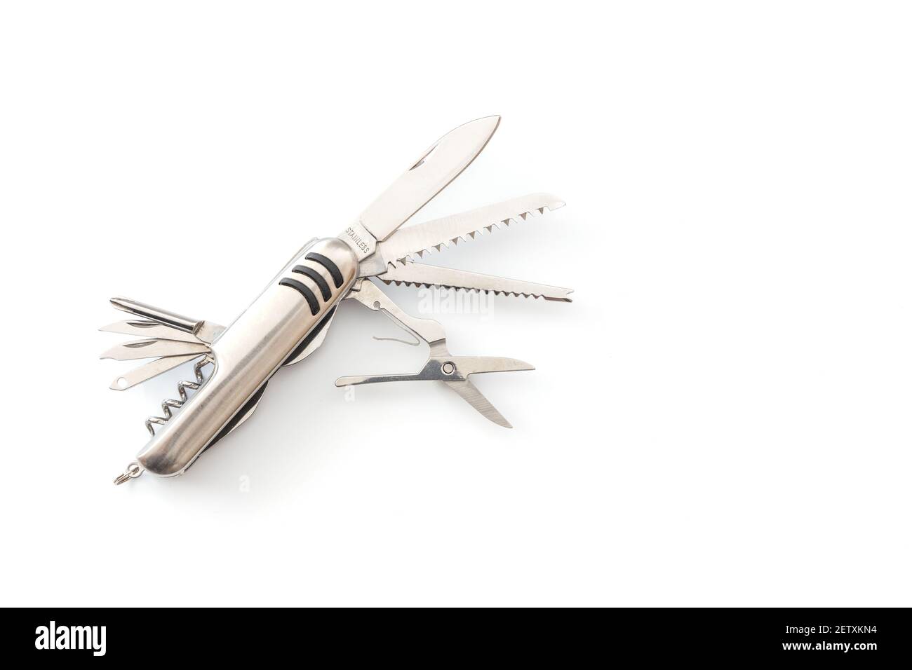 Silver pocket,multi-function swiss army pocket knife tool on white background, camping tools, close-up. Stock Photo