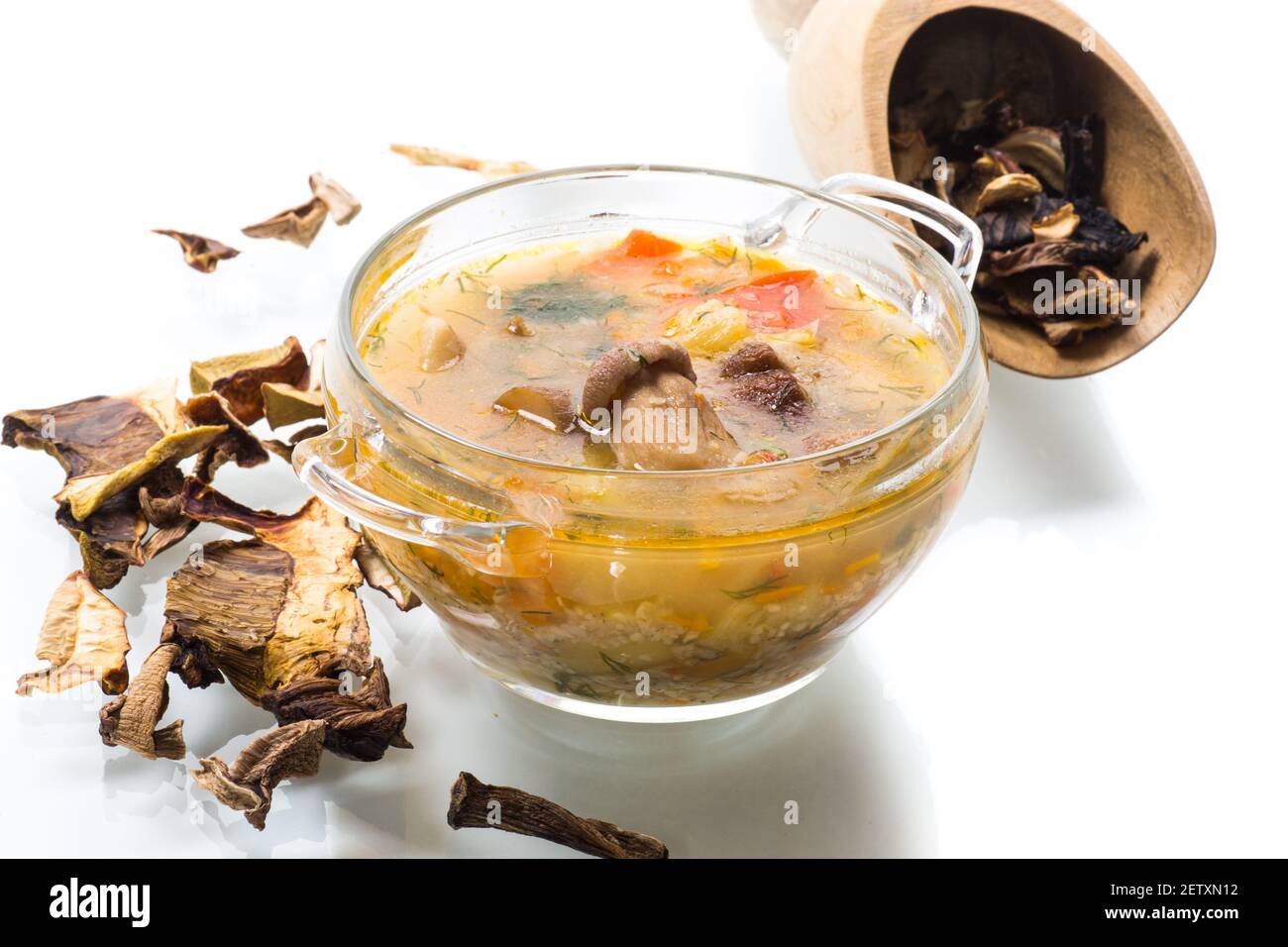 vegetarian vegetable soup with porcini mushrooms in a glass bowl