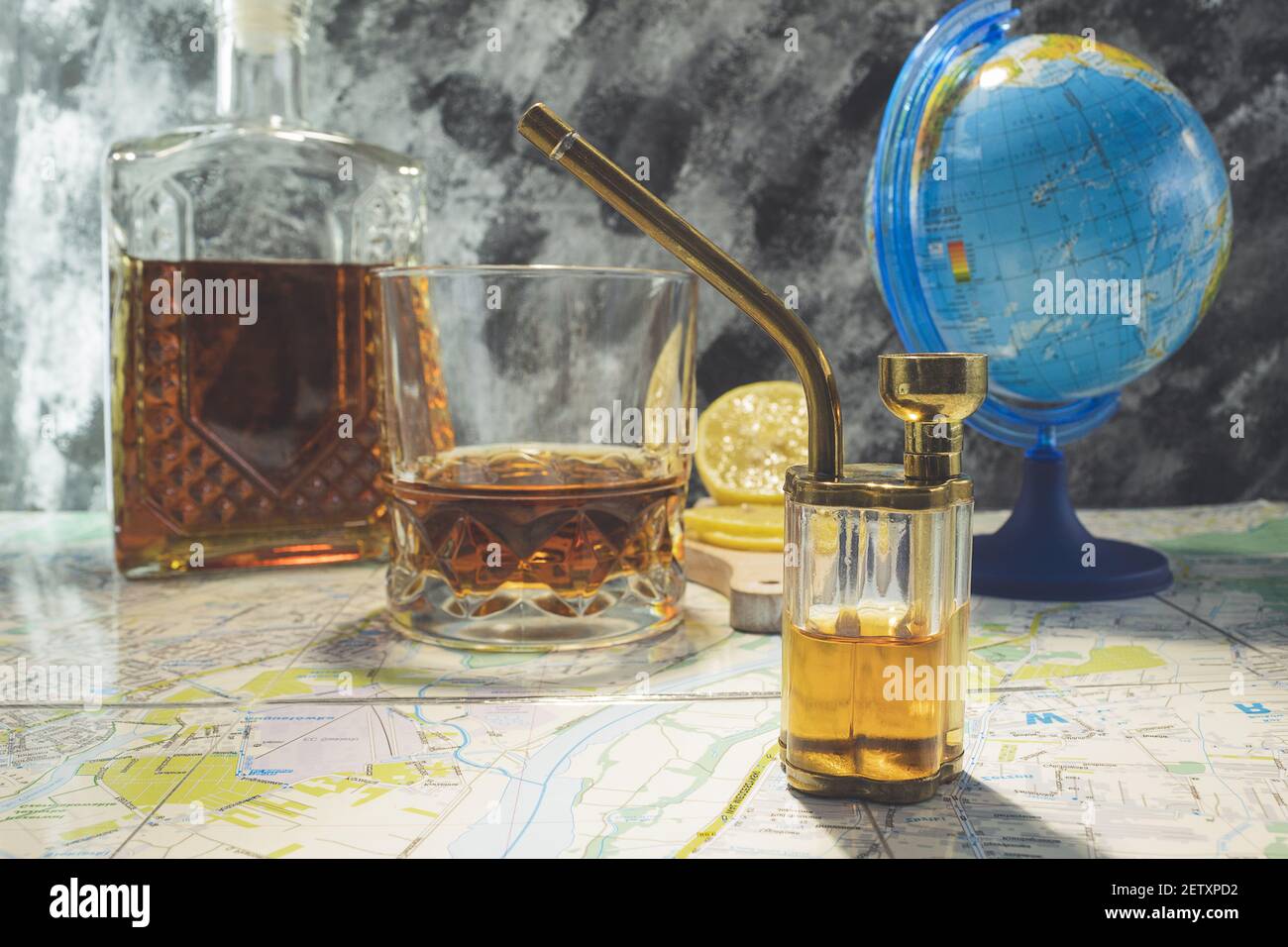 disconnected forget Arab Sarabo Glass bong for smoking marijuana with copy space. Alcohol with lemon and  drugs with a hookah on the table. Bong drug smoking pipe Stock Photo - Alamy