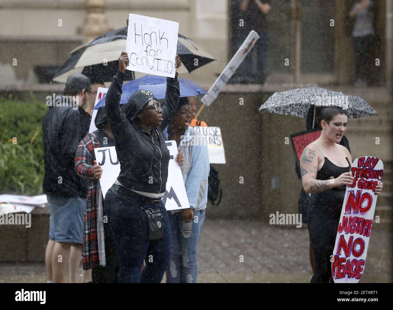 June 23, 2017; Cincinnati, OH, USA; Protesters gather at the courthouse steps as the jury deliberates in the murder trial of former University of Cincinnati police officer Ray Tensing outside the Hamilton County Courthouse in downtown Cincinnati. After more than 30 hours of deliberation without a verdict, judge Leslie Ghiz declared a mistrial. Mandatory credit: Sam Greene/The Enquirer via USA TODAY NETWROK *** Please Use Credit from Credit Field *** Stock Photo