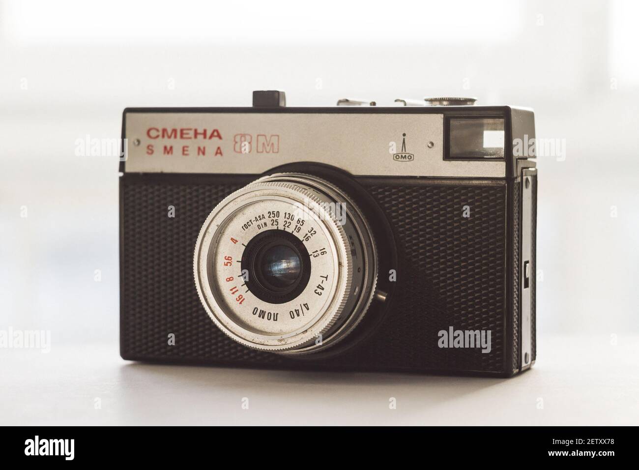 Retro photo camera Smena 8M made in USSR. Old 35 mm film camera manufactured in Soviet Union. Illustrative editorial: Ufa, Russia - January 31, 2014 Stock Photo