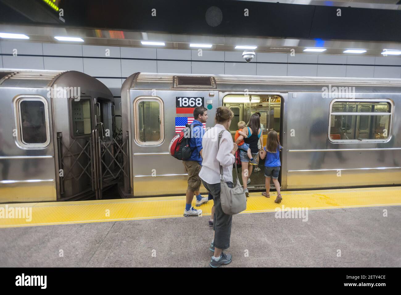 Passengers in the newly restored South Ferry subway station in New York ...