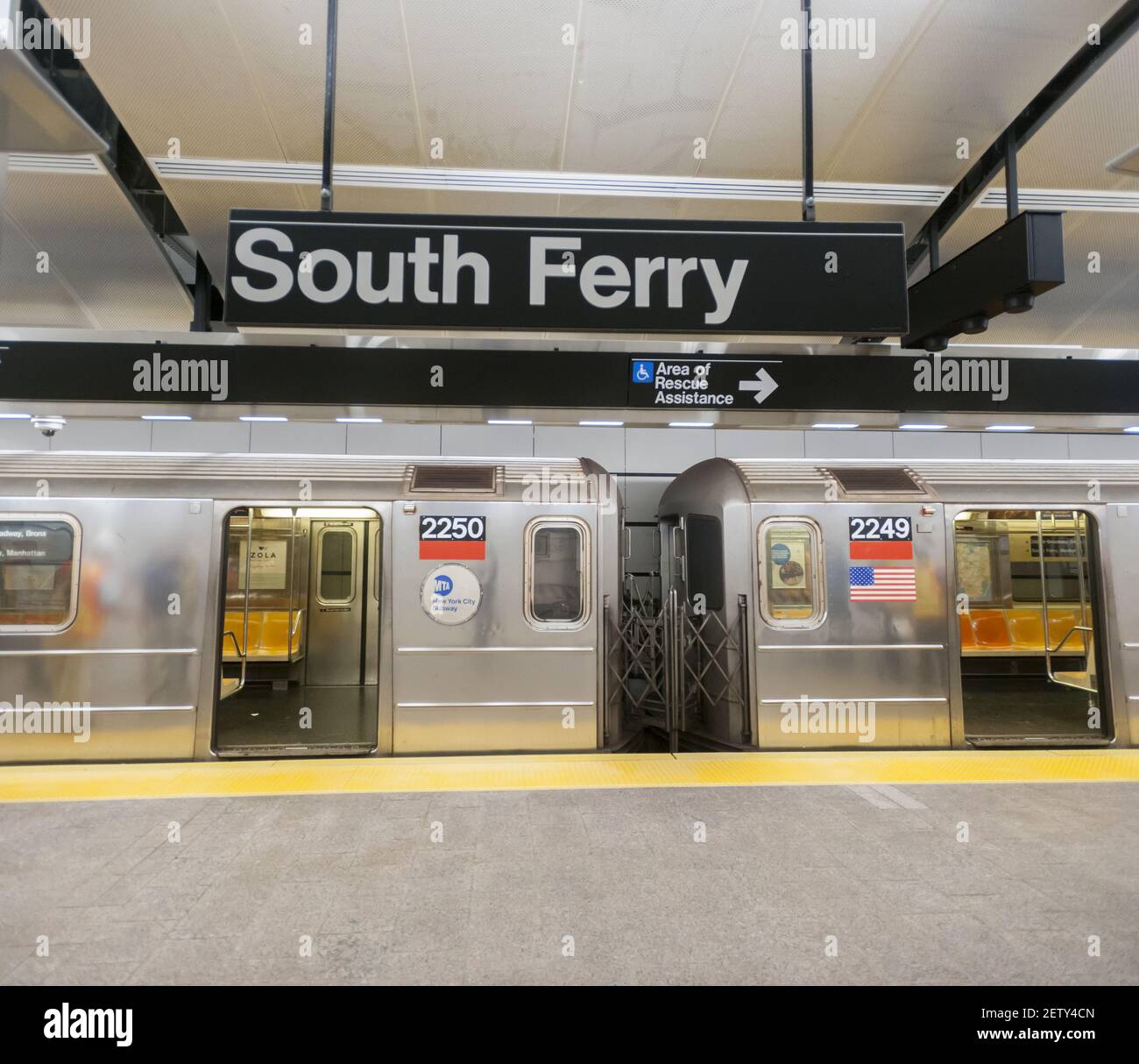 A Number 1 train waits in the newly restored South Ferry subway station ...