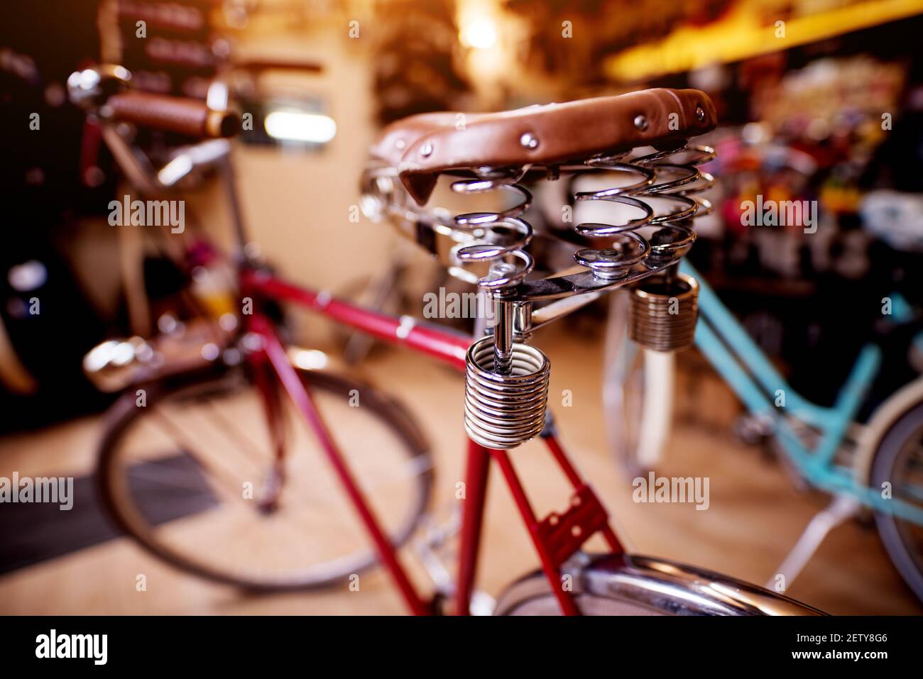 Red bicycle seat suspension Stock Photo Alamy