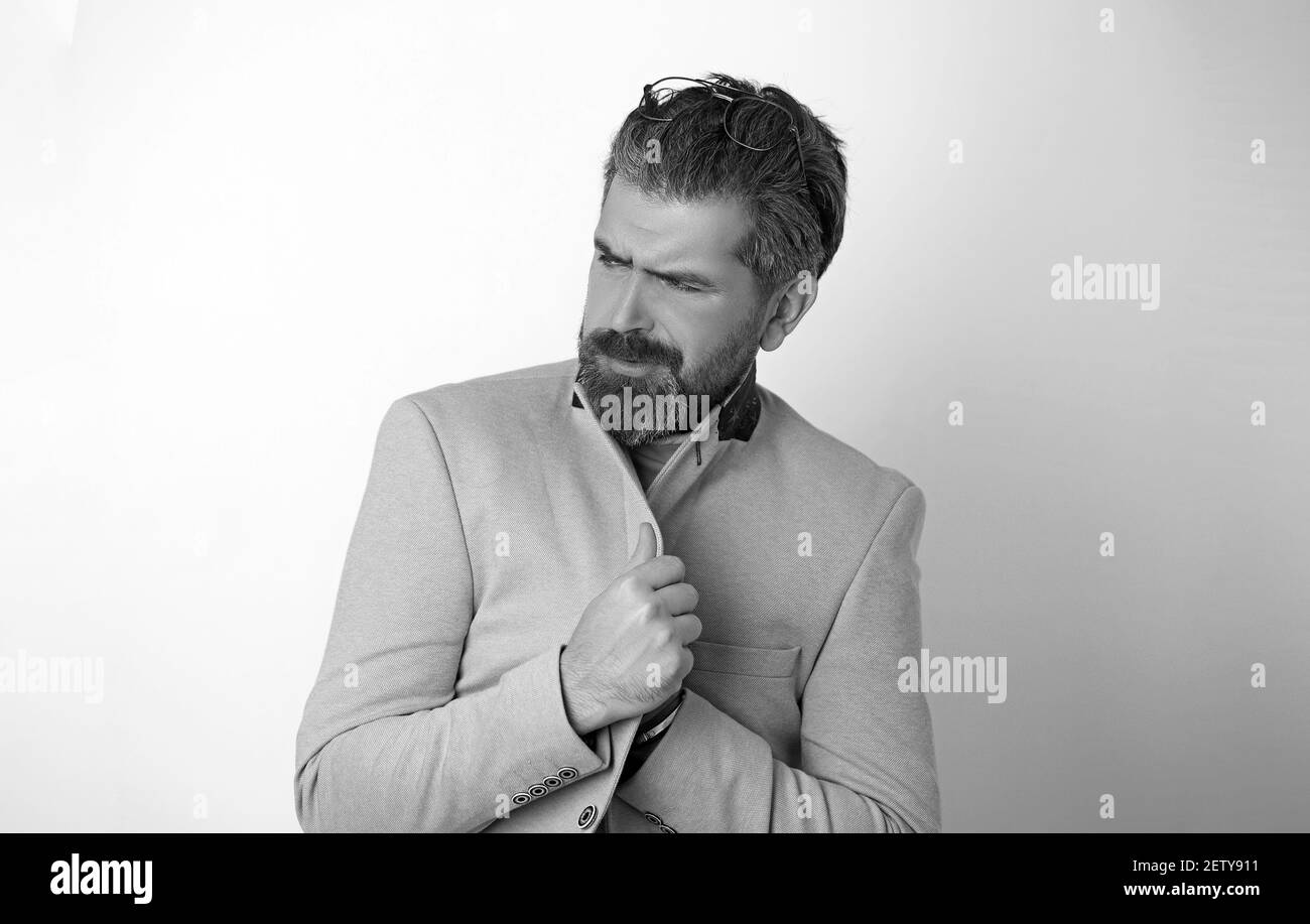 The business bearded man feeling the cold. Stock Photo