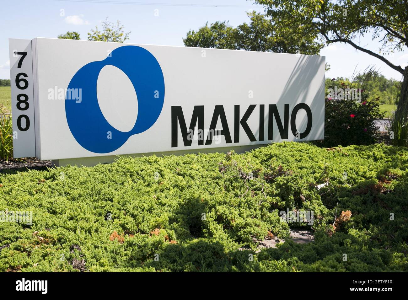 A logo sign outside of a facility occupied by Makino Milling Machine Co