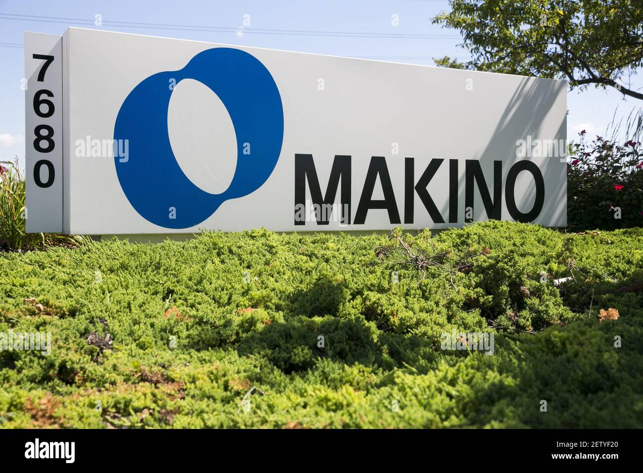 A logo sign outside of a facility occupied by Makino Milling Machine Co