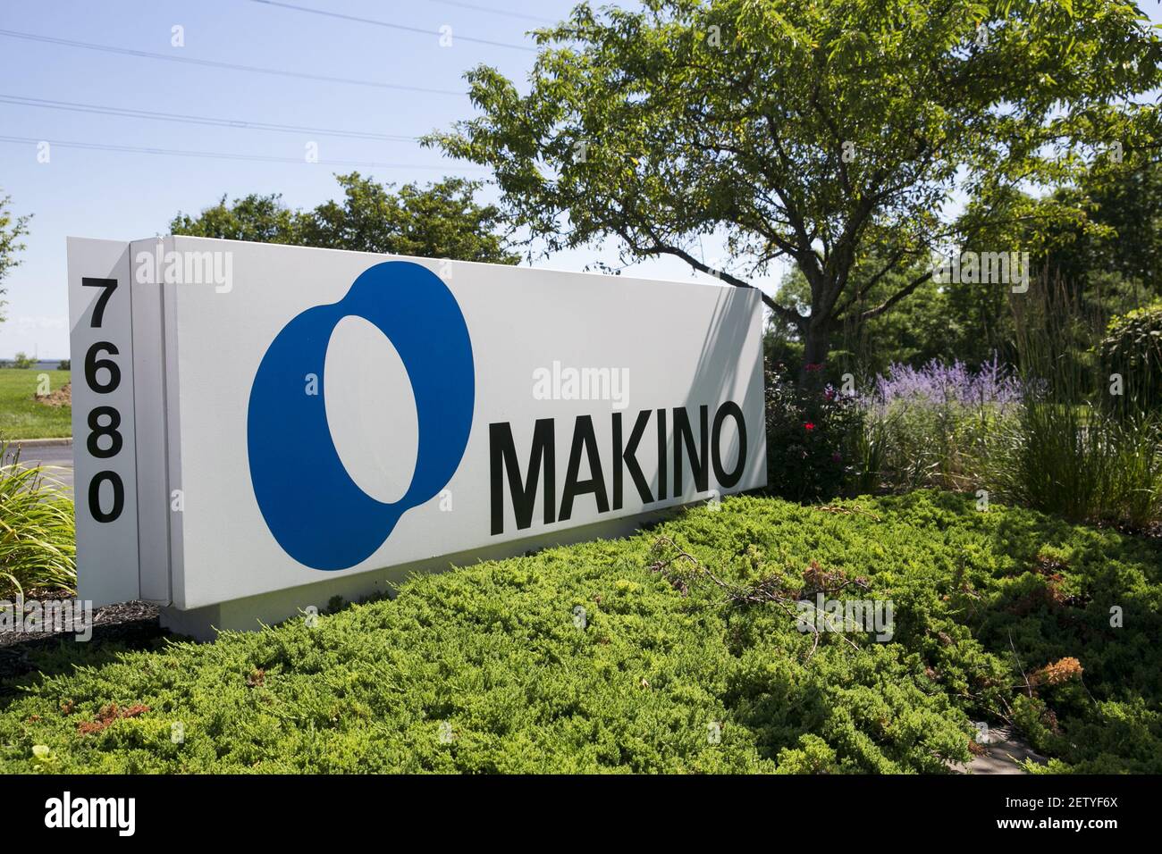 A logo sign outside of a facility occupied by Makino Milling Machine Co