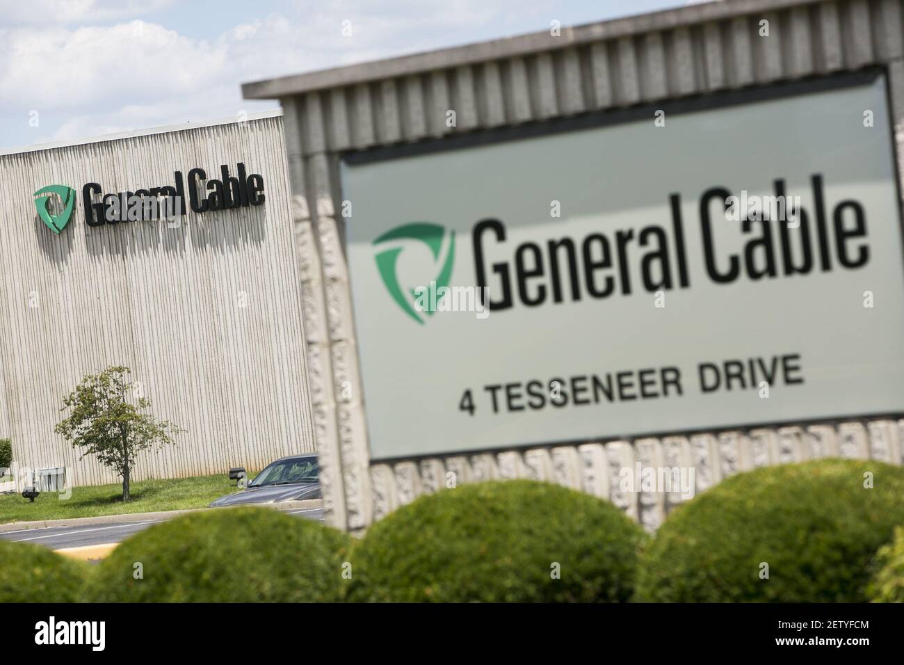 A logo sign outside of the headquarters of General Cable in Highland