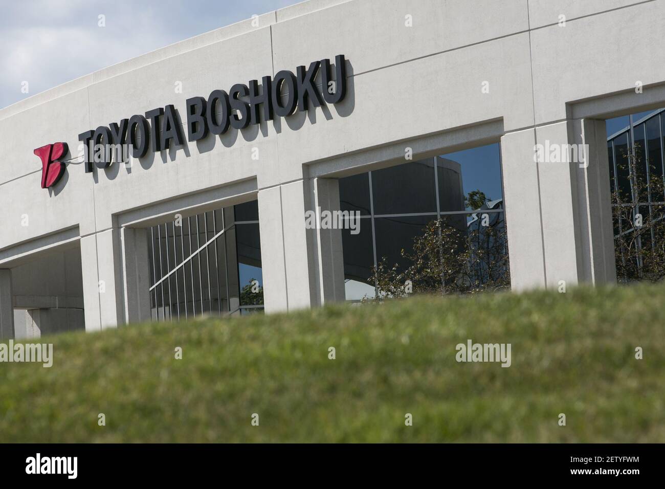 A logo sign outside of a facility occupied by the Toyota Boshoku ...