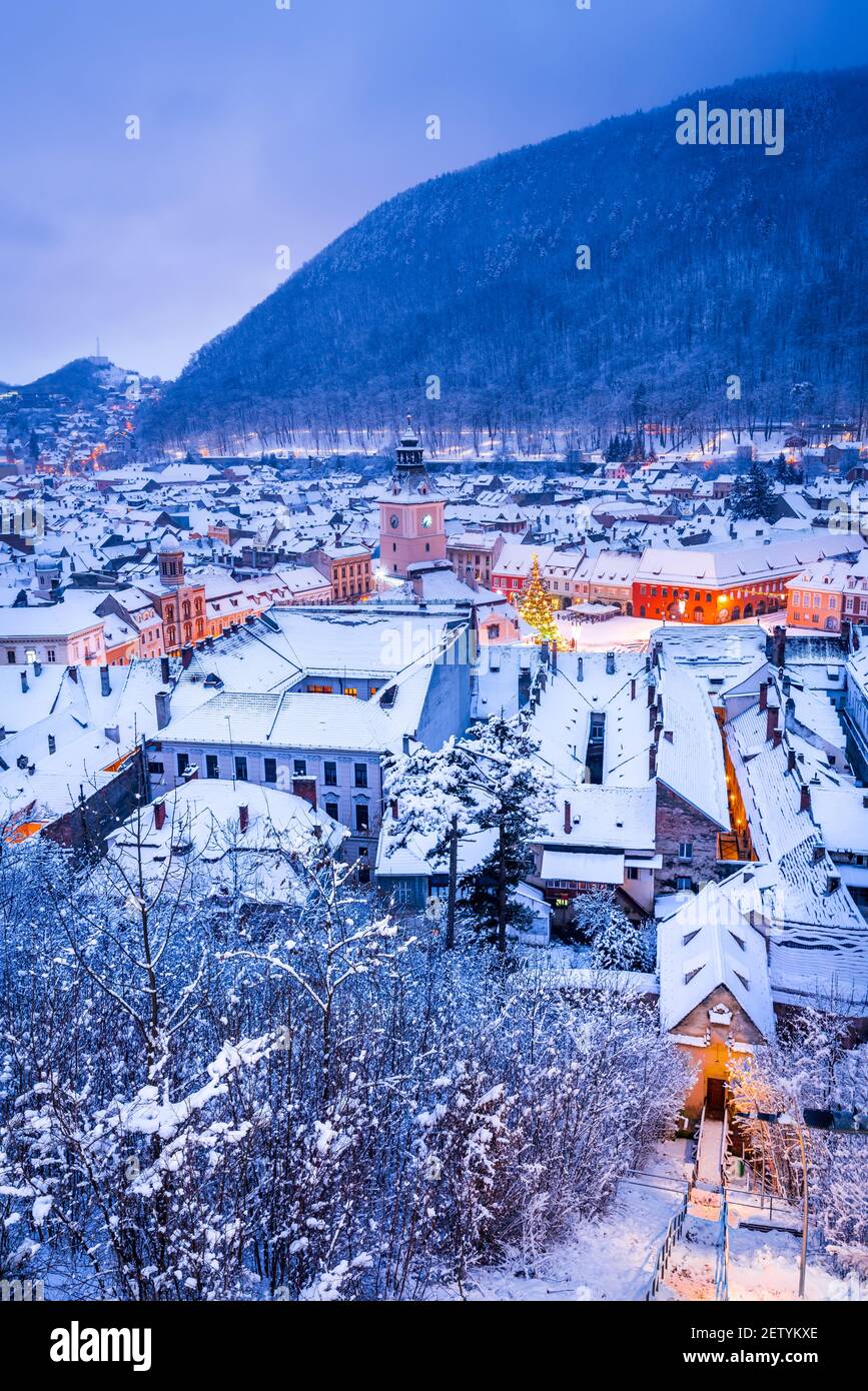 Brasov, Transylvania. Council Square and Christmas Market. Carpathian Mountains travel background in Romania. Stock Photo