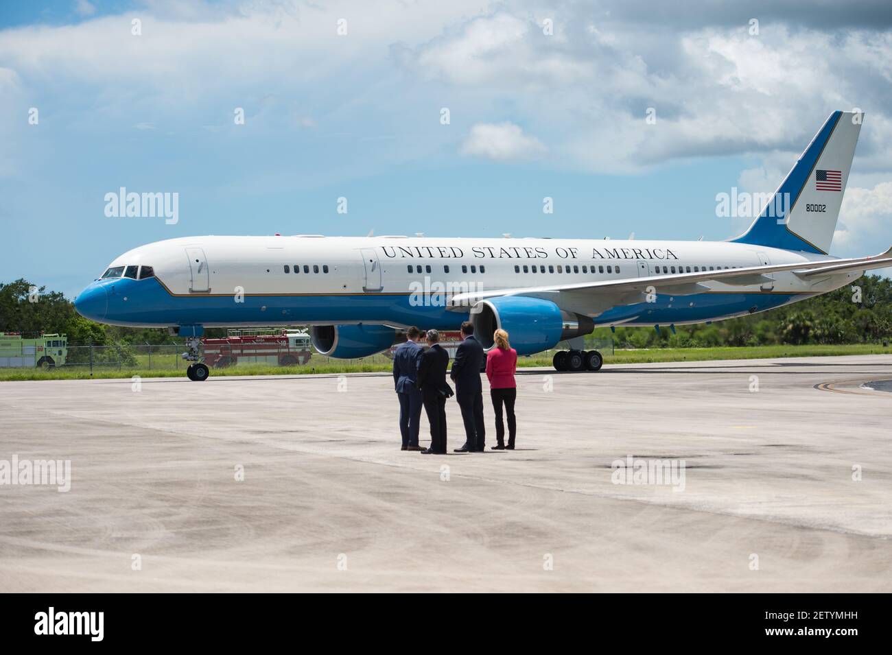 In this photo released by the National Aeronautics and Space Administration (NASA) United States Vice President Mike Pence arrives in Air Force Two as NASA Leadership looks on, at the Shuttle Landing Facility (SLF) to highlight innovations made in America and tour some of the public/private partnership work that is helping to transform Kennedy Space Center (KSC) into a multi-user spaceport on Thursday, July 6, 2017 in Cape Canaveral, Florida. (Photo by Aubrey Gemignani/NASA via CNP)*** Please Use Credit from Credit Field *** Stock Photo