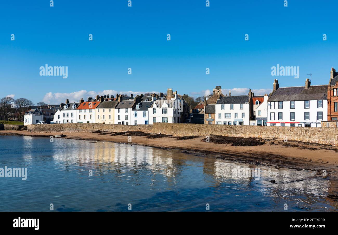 Row of historic old houses on waterfront of harbour at Anstruther in