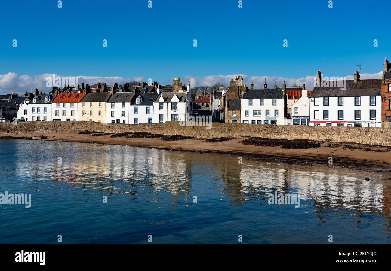 Row of historic old houses on waterfront of harbour at Anstruther in East Neuk of Fife, Scotland