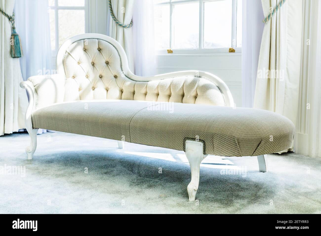 Classic Chaise Lounge in a luxurious setting Stock Photo