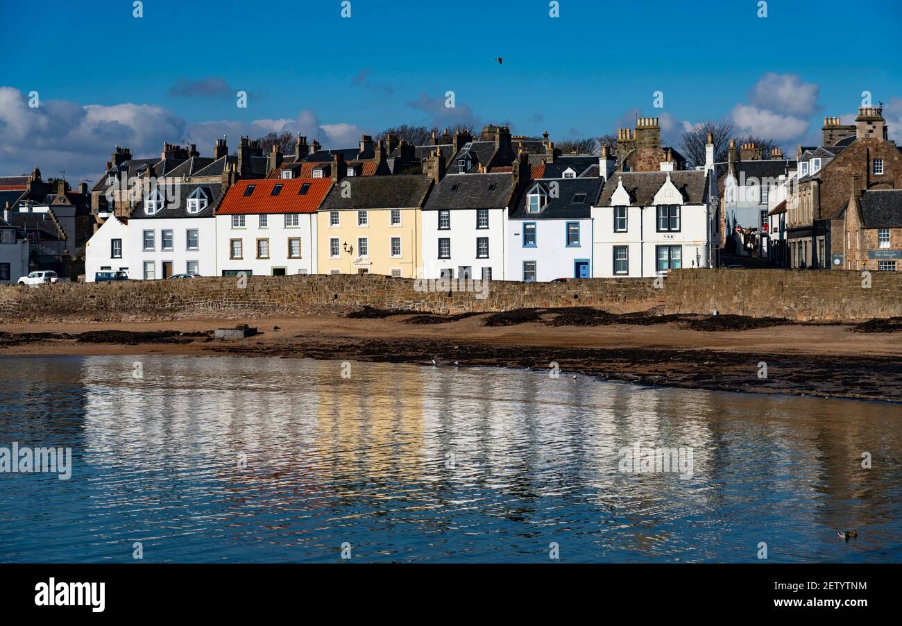 Row of historic old houses on waterfront of harbour at Anstruther in