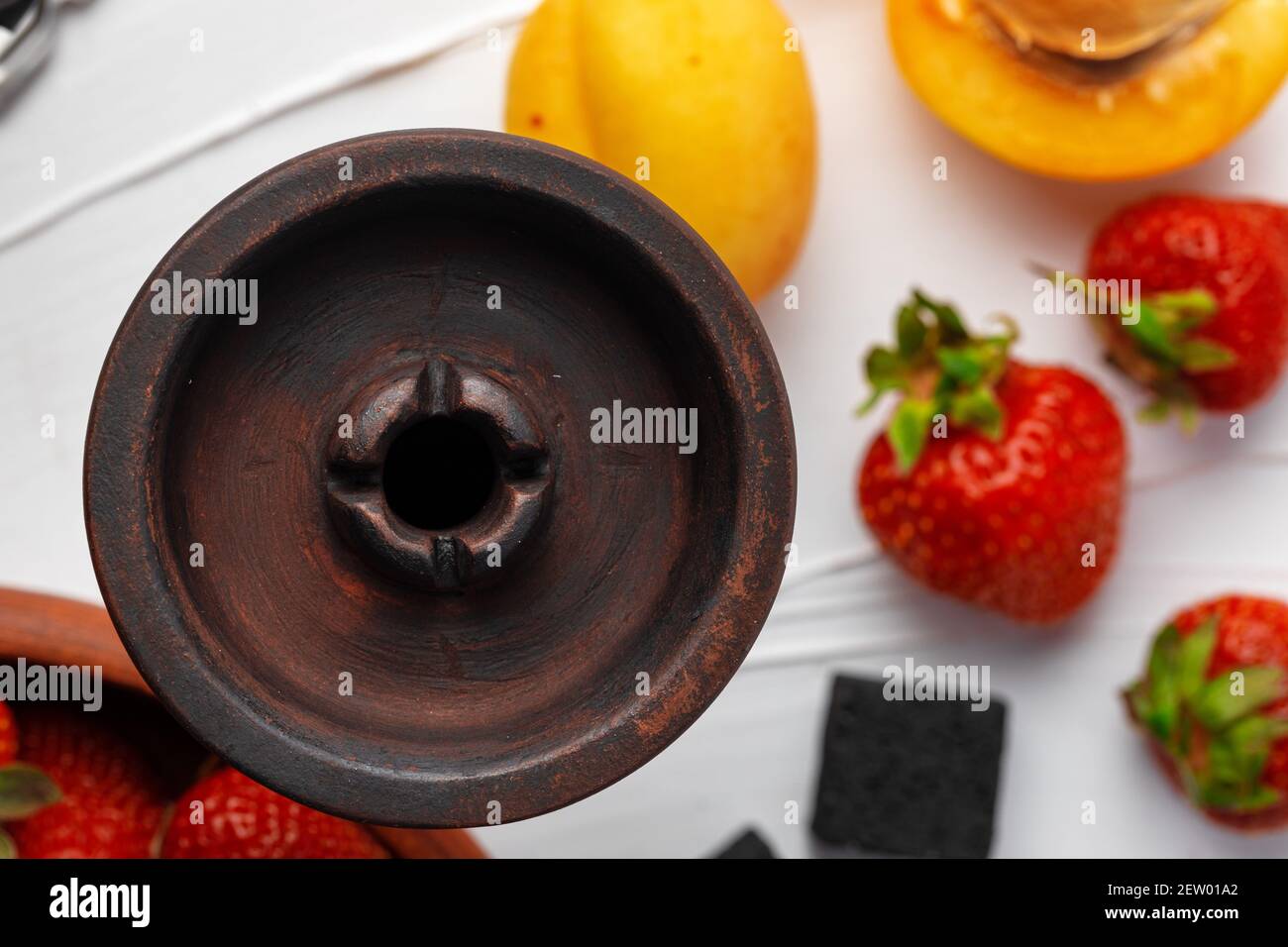 Empty hookah shaft close up on table with fresh fruit Stock Photo
