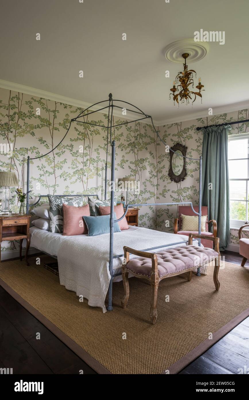 Lewis and wood beech wallpaper with vintage four poster in off grid