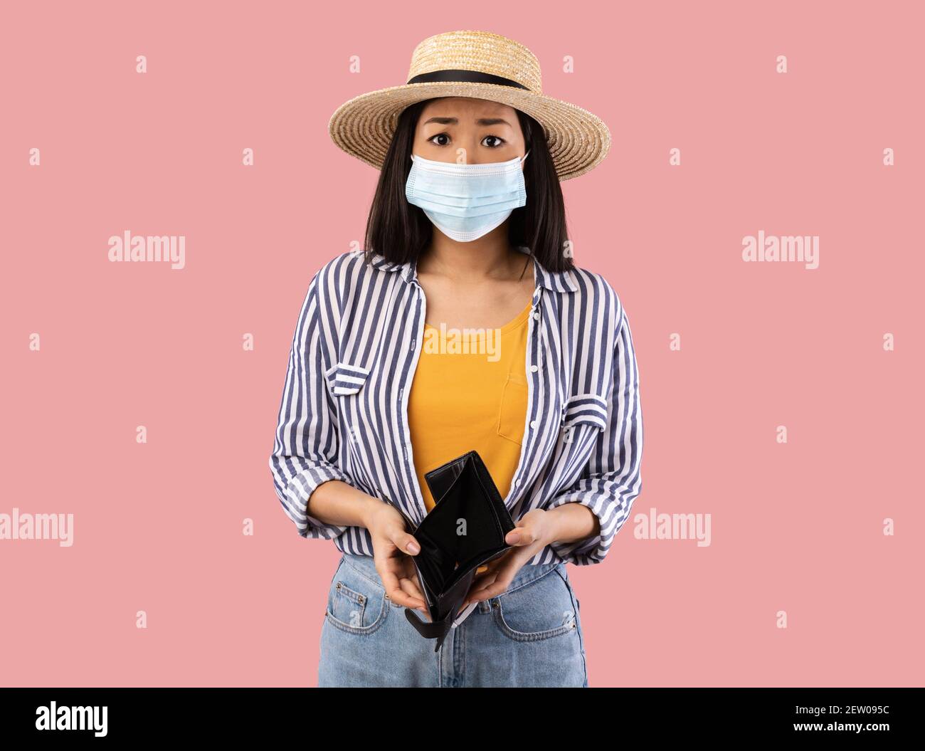 Portrait of sad asian woman in mask showing empty wallet Stock Photo ...